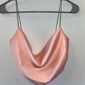 Cowel neck going out top